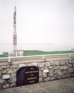 Out to sea. The memorial to submariners, and a radio mast.